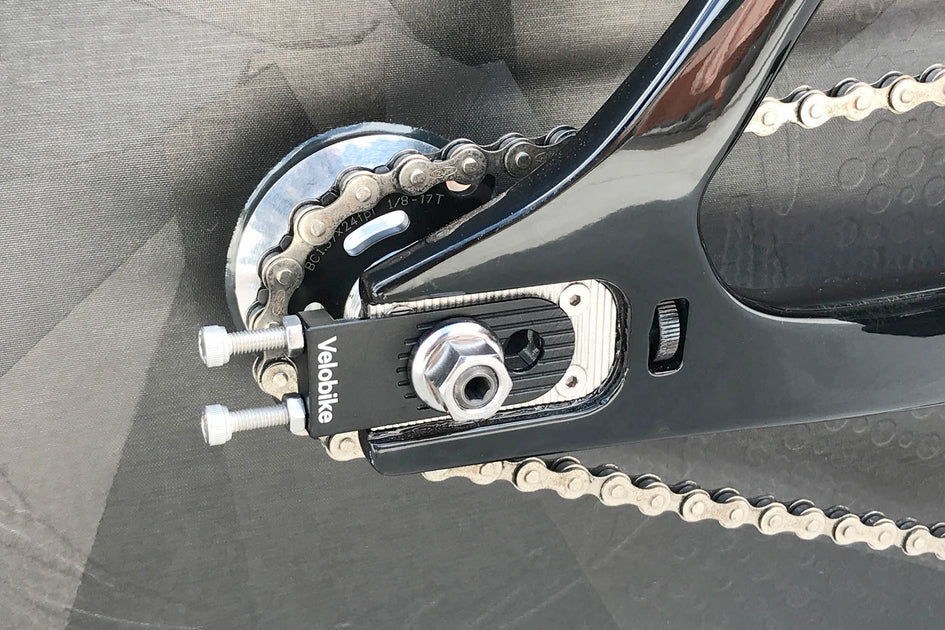 Track chain clearance tensioner